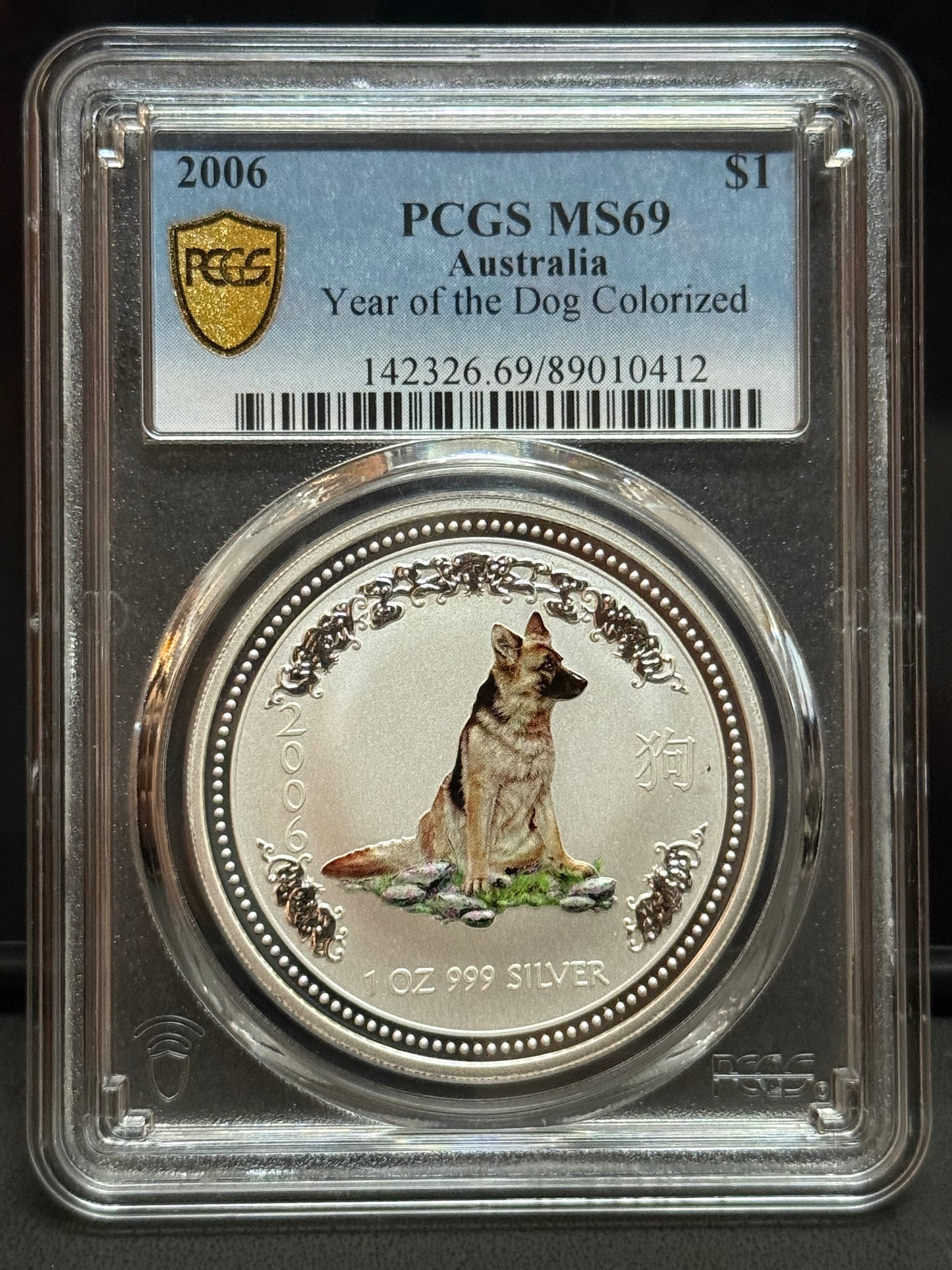 2006年澳洲-第一代狗年彩色一安士銀幣 PCGS MS69
