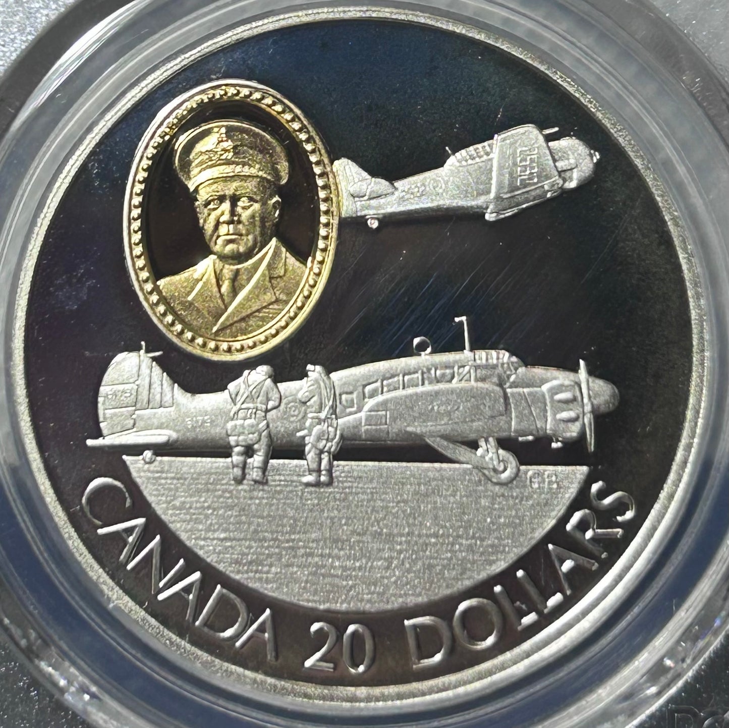 1990年加拿大發行
《航空飛行系列-Avro Anson 和 哈佛空軍元帥 Robert Leckie》
1安士24K鍍金精鑄銀幣